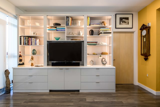 White media cabinets with display cabinetry and LED lighting