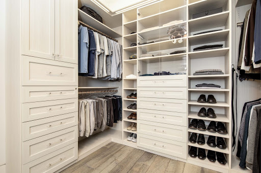 Shoe storage in Los Gatos Master Closet by Valet Custom Cabinets & Closets