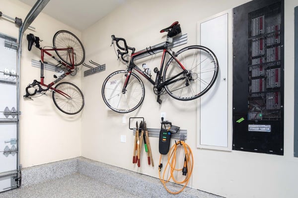 Custom Garage by Valet Custom Cabinets & Closets Omni-Track and Accessories