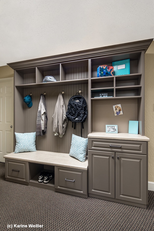 A “mud room” helps wrangle kids’ shoes and creates a more sophisticated entryway.