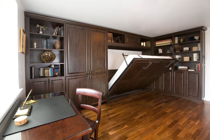 Our wall beds blend in seamlessly with your home office custom cabinetry when not in use.