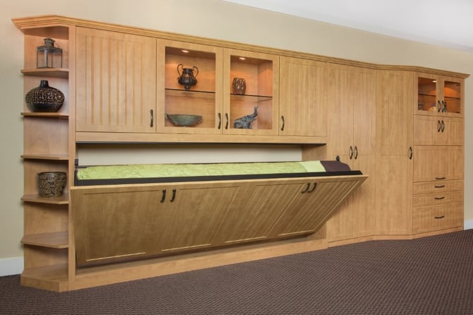 Our wall beds blend seamlessly into the cabinetry when not in use.