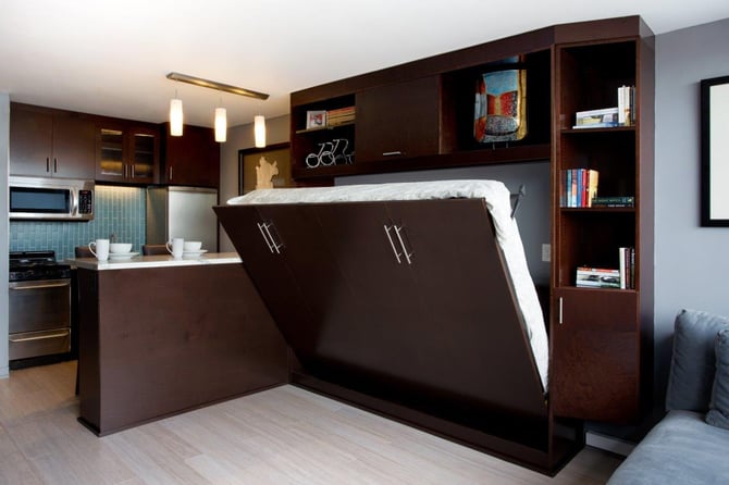 A wall bed can fold up to create more room for family activities during the day.
