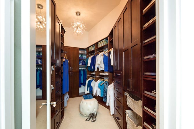 Shaker fronts add some classic elegance to a walk-in closet.
