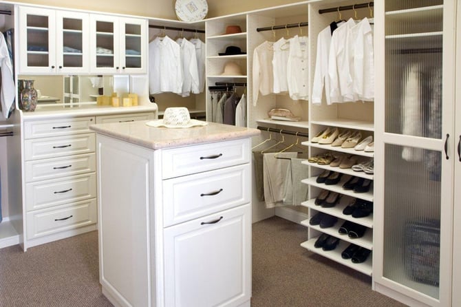 An island offers more storage and a way to break up the closet.