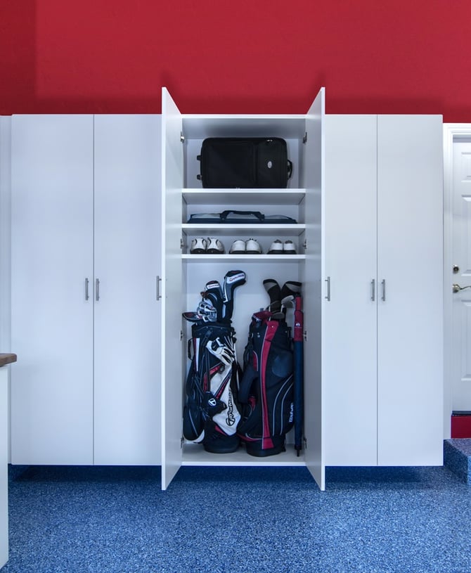  Forget leaning your clubs in the corner. Custom cabinets house all your golfing needs all in one place.