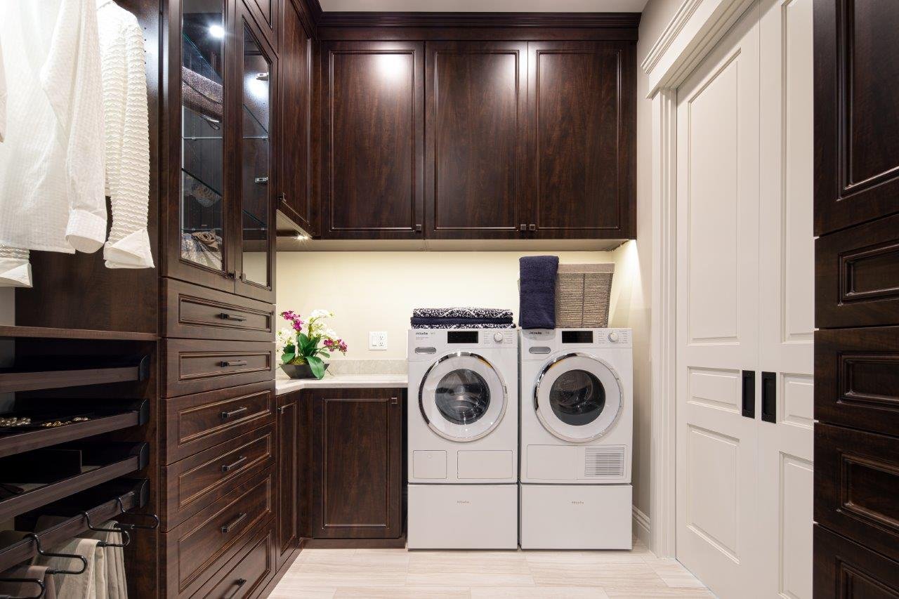 Walk-in closet with Laundry in Belgium Chocolate finish