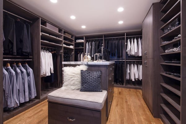 Deluxe Walk-in Closet by Valet Custom Cabinets & Closets
