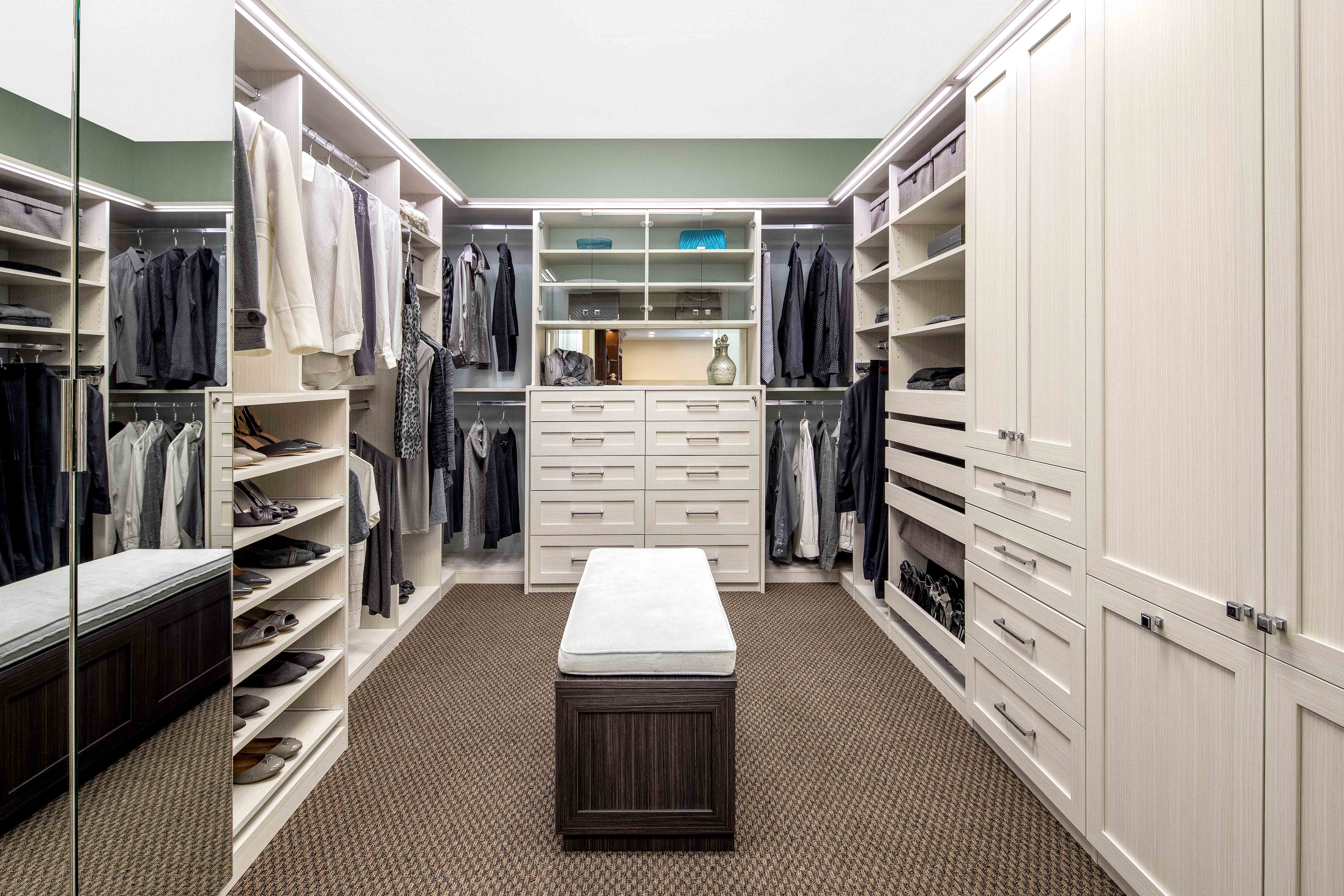 Deluxe walk-in closet at Valet Custom Cabinets & Closets in Campbell, CA