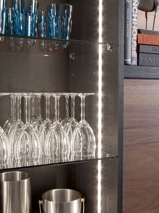  Glass shelves and LED lighting make any collection more elegant.